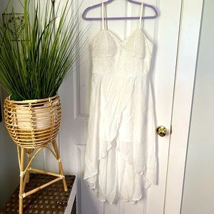 Super cute high low slight weight flowy dress with fitted top